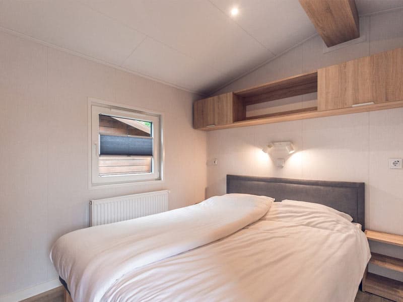 Impressie van een van de slaapkamers in deze stacaravan voor 4 personen in Voorthuizen op de Veluwe