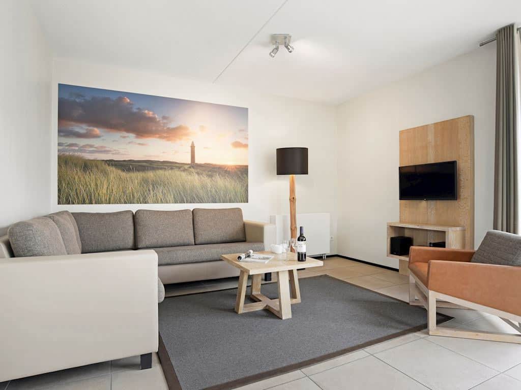 Impressie van de woonkamer in het 4-persoons huisje 4L op Landal Strand Resort Ouddorp Duin
