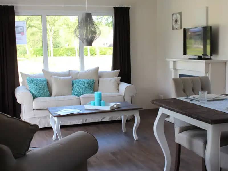 Impressie van de woonkamer in het 4-persoons chalet