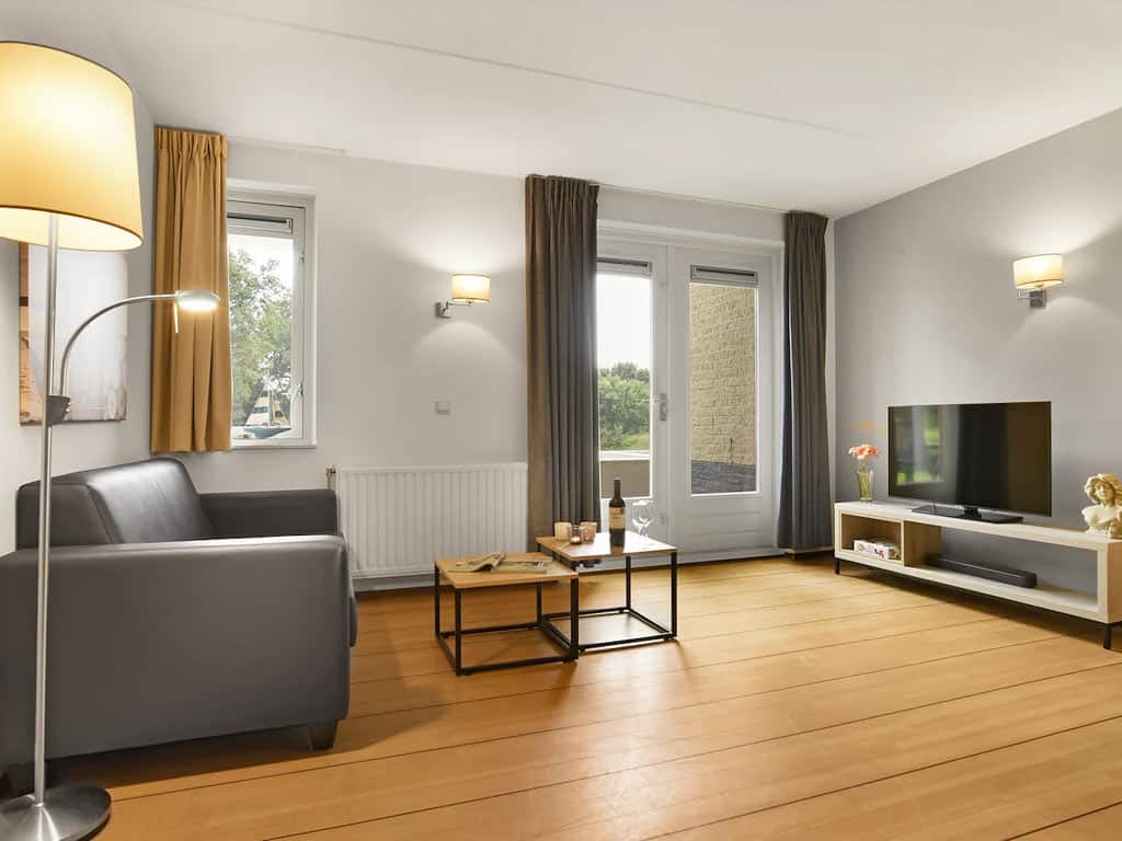 Impressie van de woonkamer in het appartement voor 4 personen op Summio Parc Port Greve 4CG in Zeeland