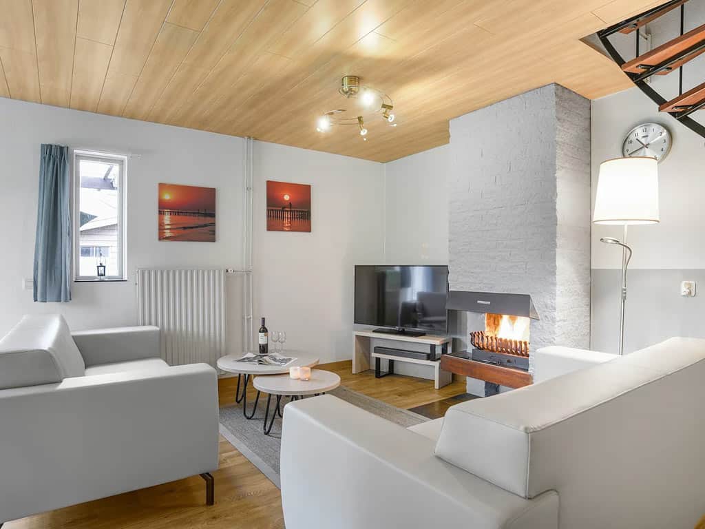 Impressie van de woonkamer in de 4-persoons bungalow 4R op Summio Parc Port Greve