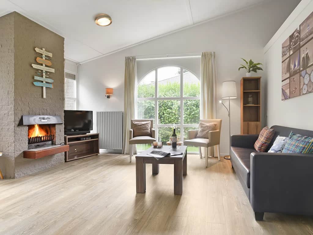 Impressie van de woonkamer in de 4-persoons bungalow 4X op Summio Parc Port Greve