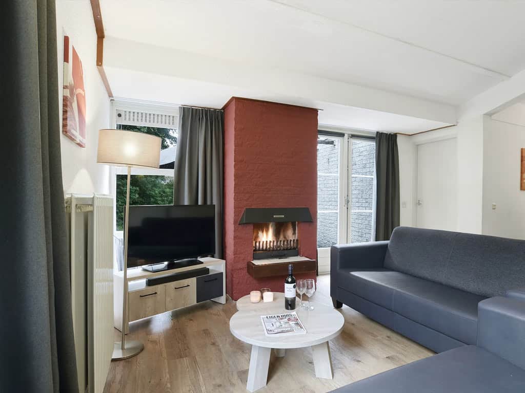 Impressie van de woonkamer in de 6-persoons bungalow 6X op Summio Parc Port Greve