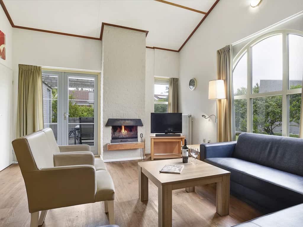 Impressie van de woonkamer in de 8-persoons bungalow 8X op Summio Parc Port Greve