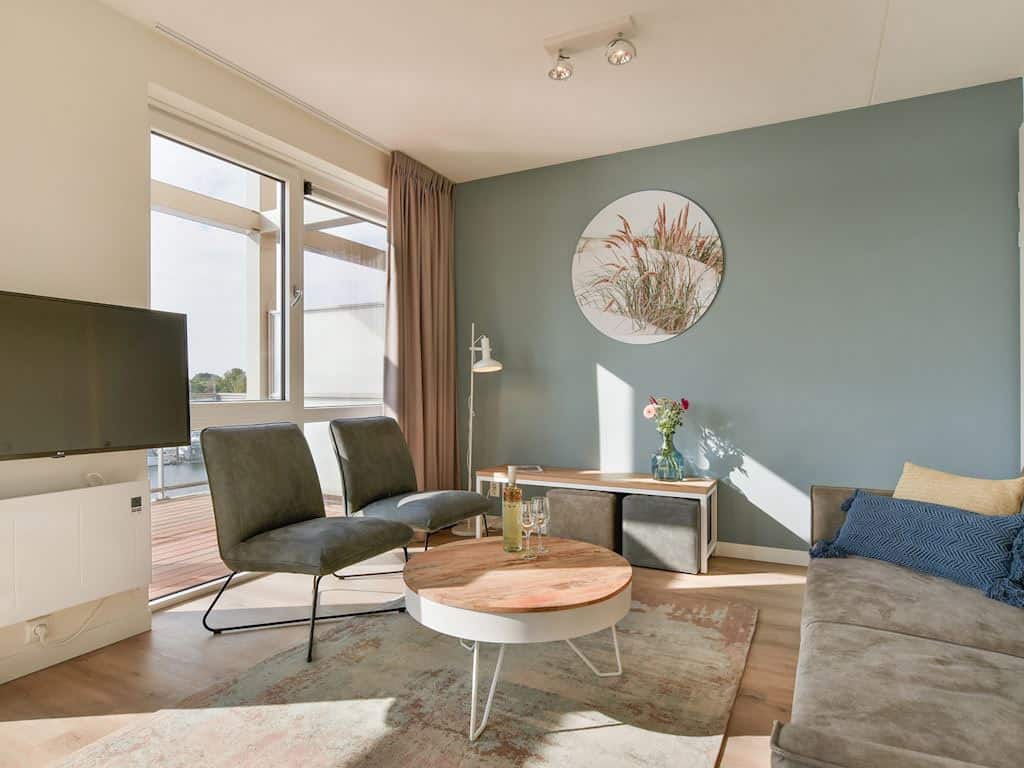 Impressie van de woonkamer in het 4-persoons appartement 4CA op Landal Marina Resort Well