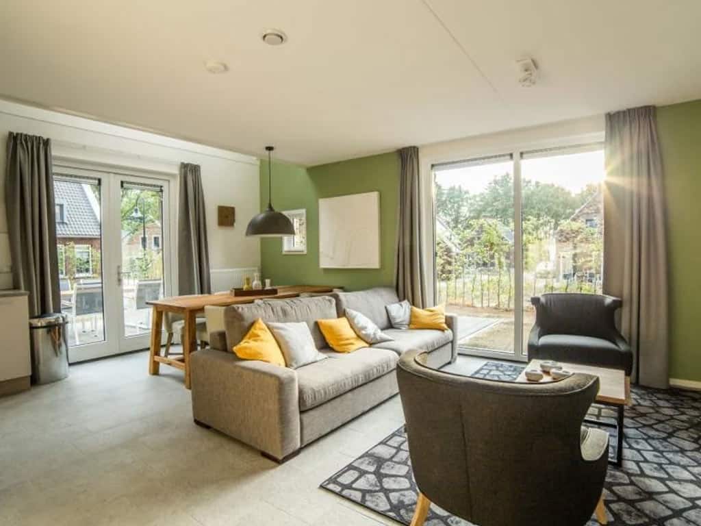 Impressie van de woonkamer in het 6-persoons Gildehuis Comfort Kids op Dormio Resort Maastricht
