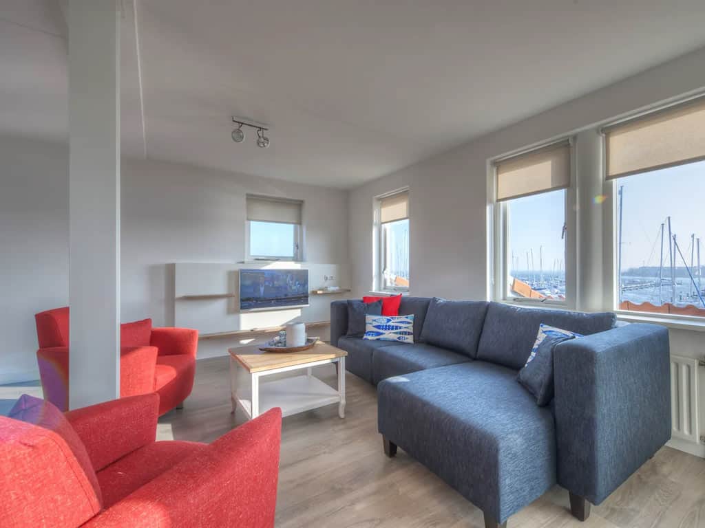 Impressie van de woonkamer in het 6-persoons Comfort 6 appartement op Summio Marina Port Zélande