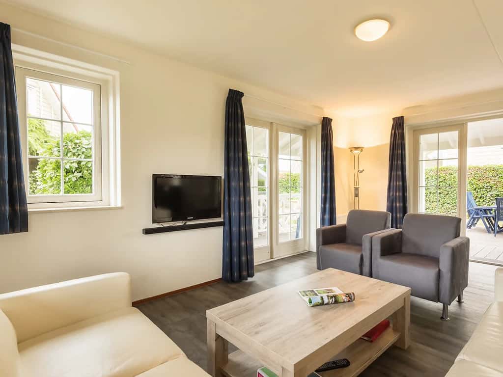 Impressie van de woonkamer in de 6-persoons villa Comfort op Summio Duynparc De Heeren van ’s-Gravensande
