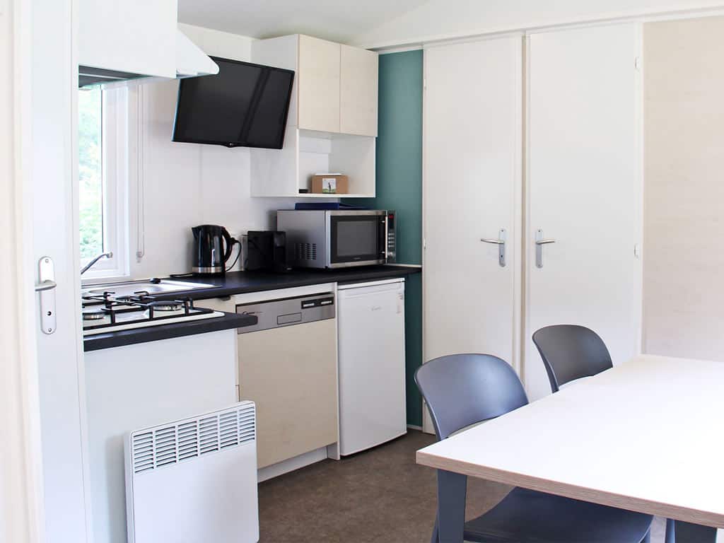 Impressie van de inrichting van het 4-persoons chalet Koolmees op Molecaten park Kuierpad in Drenthe