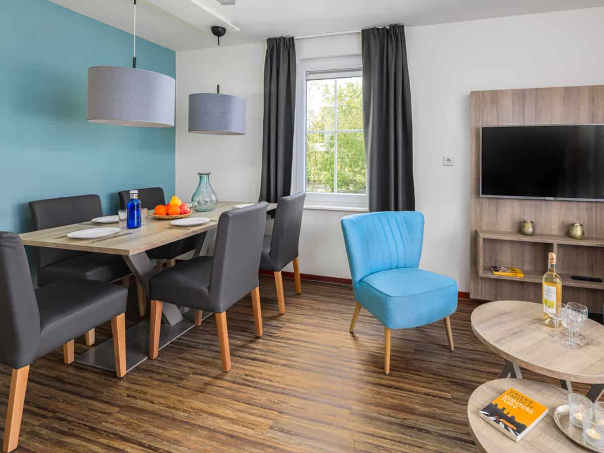 Impressie van de inrichting van bungalow GB16 Comfort voor 16 personen op Roompot Résidence Klein Vink in Arcen